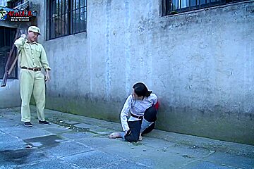 2 Chinese Rebels Chained Up