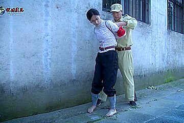 2 Chinese Rebels Chained Up