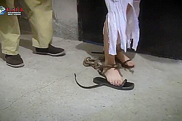 2 Chinese Rebels Chained Up