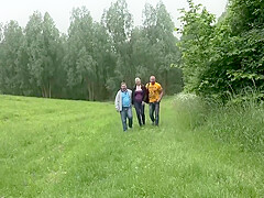 A Chubby German Blonde Pleasing Two Cocks Outdoors