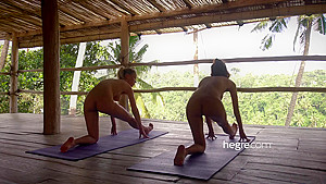 A nude yoga in the tropical forests