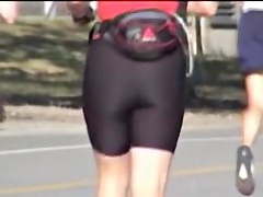 Amateur girl teases cameraman with her candid booty 01b
