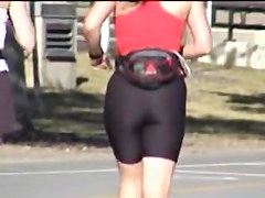 Amateur girl teases cameraman with her candid booty 01b
