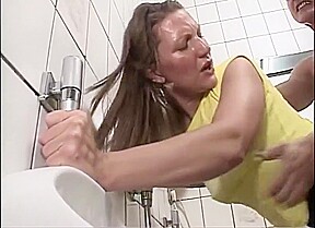 An exciting fuck on a public toilet 
