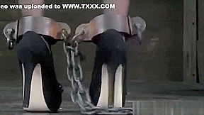 BDSM sub spanked while in stocks