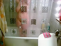 Big natural tits woman showering