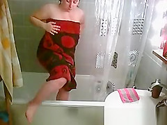 Big natural tits woman showering