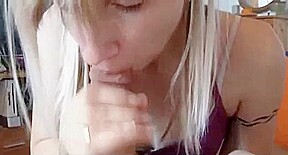 Blonde jerks a guy off with a little cock sucking