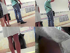 Brunette seen wearing a sexy thong in upskirt movie