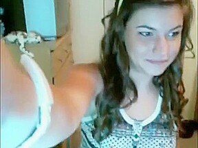 Brunette showing her nice tits on webcam