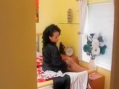 Busty MILF exposes her big natural tits to a