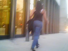 Candid brunette wearing glasses with BIG ass in jeans