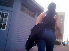 Candid brunette wearing glasses with BIG ass in jeans