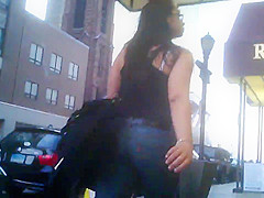 Candid brunette wearing glasses with BIG ass in jeans