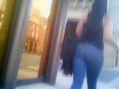Candid brunette wearing glasses with BIG ass in jeans