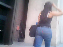 Candid brunette wearing glasses with BIG ass in jeans