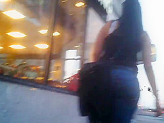Candid brunette wearing glasses with BIG ass in jeans