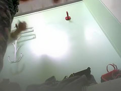 Changing room footage of girl trying on bras