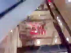 Cool chick in a blue dress at the mall 