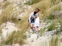 Couple caught fucking in the beach dunes
