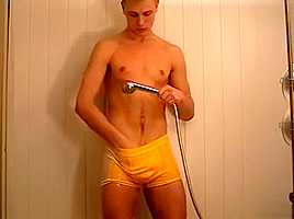 Cute twink King showers after urinating all over himself