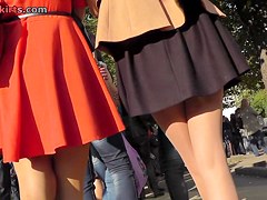 Cute upskirt beauties have a fun a sunny day