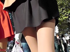 Cute upskirt beauties have a fun a sunny day