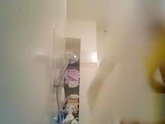 Cutie shows off her crotch while taking a shower