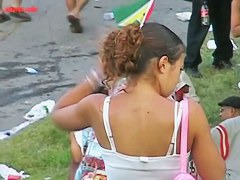 Dark skinned beauty stands in short shorts and a thong ass vid