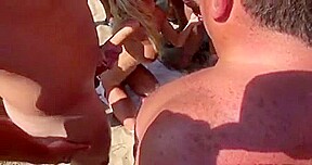 Dozens strangers men pour blonde on beach Cap d'Agde