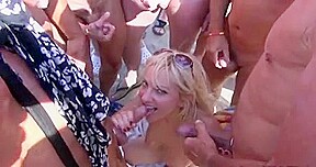 Dozens strangers men pour blonde on beach Cap d'Agde