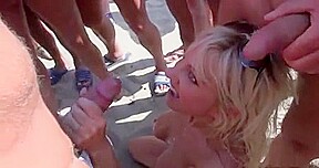 Dozens strangers men pour blonde on beach Cap d'Agde