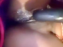 Ebony girl playing with her wet pussy and squirt
