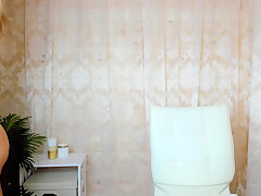 Elegant blonde mature stripping