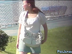 Embarrassed Asian Peeing