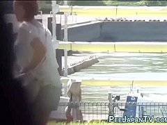 Embarrassed Asian Peeing
