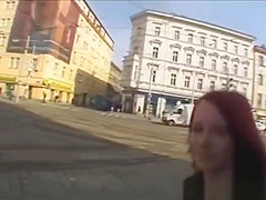 European redhead girl shows off her tits and pussy outdoor for cash