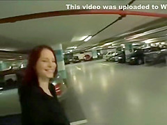 European redhead girl shows off her tits and pussy outdoor for cash