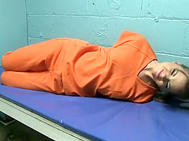 Female Prisoner Strapped in for Transport (She will not return)