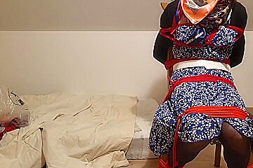 Girl Chairtied With Ropes And Scarf