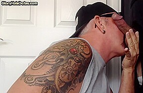 Gloryhole tattooed DILF sucks BFs cock in private amateur BJ
