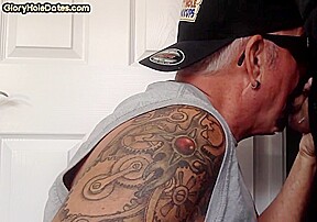 Gloryhole tattooed DILF sucks BFs cock in private amateur BJ