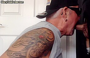 Gloryhole tattooed DILF sucks BFs cock in private amateur BJ