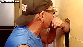 Gray gaydaddy giving head and tugjob to gloryhole top