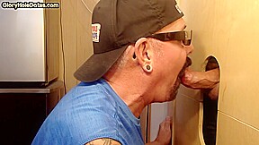 Gray gaydaddy giving head and tugjob to gloryhole top