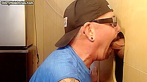 Gray gaydaddy giving head and tugjob to gloryhole top