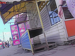 G-string of a sexy lassie seen in free upskirt video