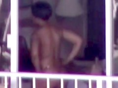 HI black girl nude in the window