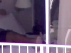 HI black girl nude in the window
