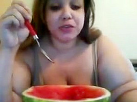 Hot girl eating watermelon